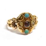 A VICTORIAN POISON RING The compartment set with a central garnet, two turquoise stones and two seed