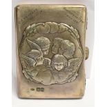 A LATE VICTORIAN SILVER CARD CASE/PURSE The case embossed front and back with five Cherubs and