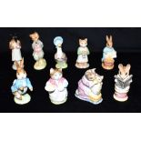 NINE BESWICK BEATRIX POTTER FIGURES five with gold backstamps: 'Tailor of Gloucester', 'Ribby', '