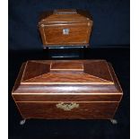 A BRASS MOUNTED VICTORIAN ROSEWOOD TEA CADDY of sarcophagus form, the fitted interior with twin