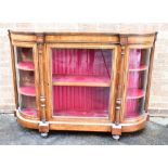 A VICTORIAN GILT METAL MOUNTED WALNUT CREDENZA with marquetry inlaid frieze above glazed door
