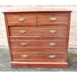 AN EDWARDIAN WALNUT CHEST OF TWO SHORT AND THREE LONG DETAILS on plinth base, 106cm wide 51cm deep