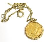 A GOLD TEN POUND COIN 1987 mounted in 9ct gold for pendant, on a base metal chain, gross weight