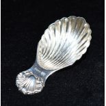 A SILVER CADDY SPOON with shell bowl and handle, length 8.5cm, hallmarked for Birmingham, date