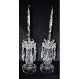 A PAIR OF WATERFORD CRYSTAL TABLE LUSTRE CANDLESTICKS each with ten pendant drops, 25cm high