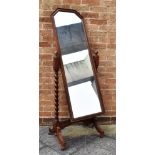 AN OAK CHEVAL MIRROR with barley twist uprights, 57cm wide 156cm high overall Condition Report :
