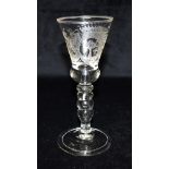 A WINE GLASS, POSSIBLE JACOBITE INTEREST the funnel shaped bowl engraved with a crown and oak