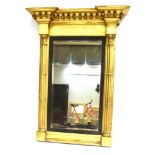 A REGENCY GILT FRAMED PIER MIRROR with inverted breakfront cornice mounted with spheres, the