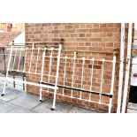 A VICTORIAN BRASS AND IRON DOUBLE 4'6' BEDSTEAD with irons, the head 136cm high Condition Report :