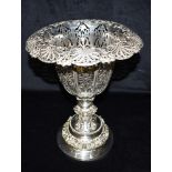 A LARGE SILVER CUP of ornate form, with pierced bowl and top, lion figural detail to the trunk and a