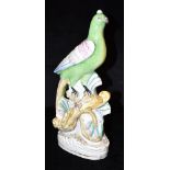 A VICTORIAN STAFFORDSHIRE FIGURE OF A PARROT 35cm high Condition Report : overall crazing, very