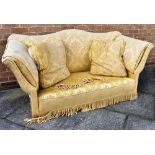 AN EDWARDIAN UPHOLSTERED TWO SEATER CAMEL BACK SOFA 175cm wide 85cm deep 85cm high Condition