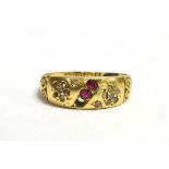 AN 18CT GOLD DIAMOND AND RUBY DRESS RING the shank marked for Birmingham 1902, ring size N-N ½ ,