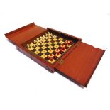 A BONE TRAVELLING CHESS SET natural white and stained red, the kings 1.5cm high (excluding
