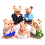 A SET OF FIVE 'NAT WEST' POTTERY PIGGY BANKS comprising Sir Nathaniel Westminster, Lady Hilary,