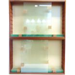 A PAIR OF GLAZED WOOD WALL DISPLAY CABINETS each with seven adjustable glass shelves and sliding