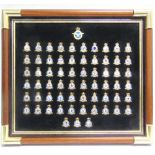 A DANBURY MINT 'THE SQUADRONS OF THE ROYAL AIR FORCE' BADGE COLLECTION comprising sixty-three