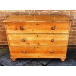 PINE CHEST OF THREE LONG DRAWERS raised on bun feet, H 91cm x W 120cm x D 50cm