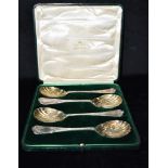 A CASED SET OF FOUR SILVER MAPPIN AND WEBB BERRY SPOONS hallmarked for London 1907, maker M&W,
