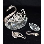 TWO WHITE METAL SWAN OVERLAY CUT GLASS DISHES The smaller swan marked 925, length x Height 14cm x