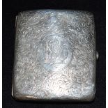 A SILVER CIGARETTE CASE With an engraved foliate pattern and monogrammed cartouche, hallmarked for