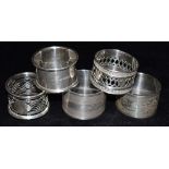 A COLLECTION OF FIVE SILVER NAPKIN RINGS weight 134grams