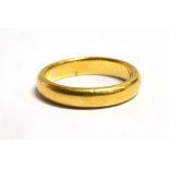 A 22 CARAT GOLD BAND RING hallmarked for Birmingham 1927, ring size N, weight 6.2grams