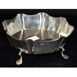 AN EDWARDIAN SILVER BOWL Of octagonal plain form on four splayed feet, hallmarked for London 1902,