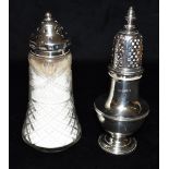 A SILVER SUGAR SIFTER together with a silver topped cut glass sugar sifter, the sugar sifter