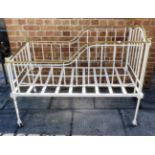 TWO EDWARDIAN IRON AND BRASS COTS