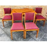 A GORDON RUSSELL EXTENDING DINING TABLE and set of four chairs, the table 78cm deep 153cm long fully