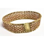 A 9CT GOLD MESH BRACELET With secure clasp marked Birmingham date letter O 17cm long, 1.7 cm wide,