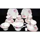 A COLLECTION OF SHELLEY 'REGENT' SHAPE TEAWARES decorated in the 'Dog Roses' pattern, W12275,