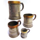 [CHIPPENHAM, WILTSHIRE INTEREST]. A GRADUATED GROUP OF THREE PEWTER TANKARD MEASURES comprising a