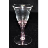 A WINE GLASS WITH COLOURED AIR TWIST STEM bell shaped bowl, pontil mark to base, 13cm high Condition