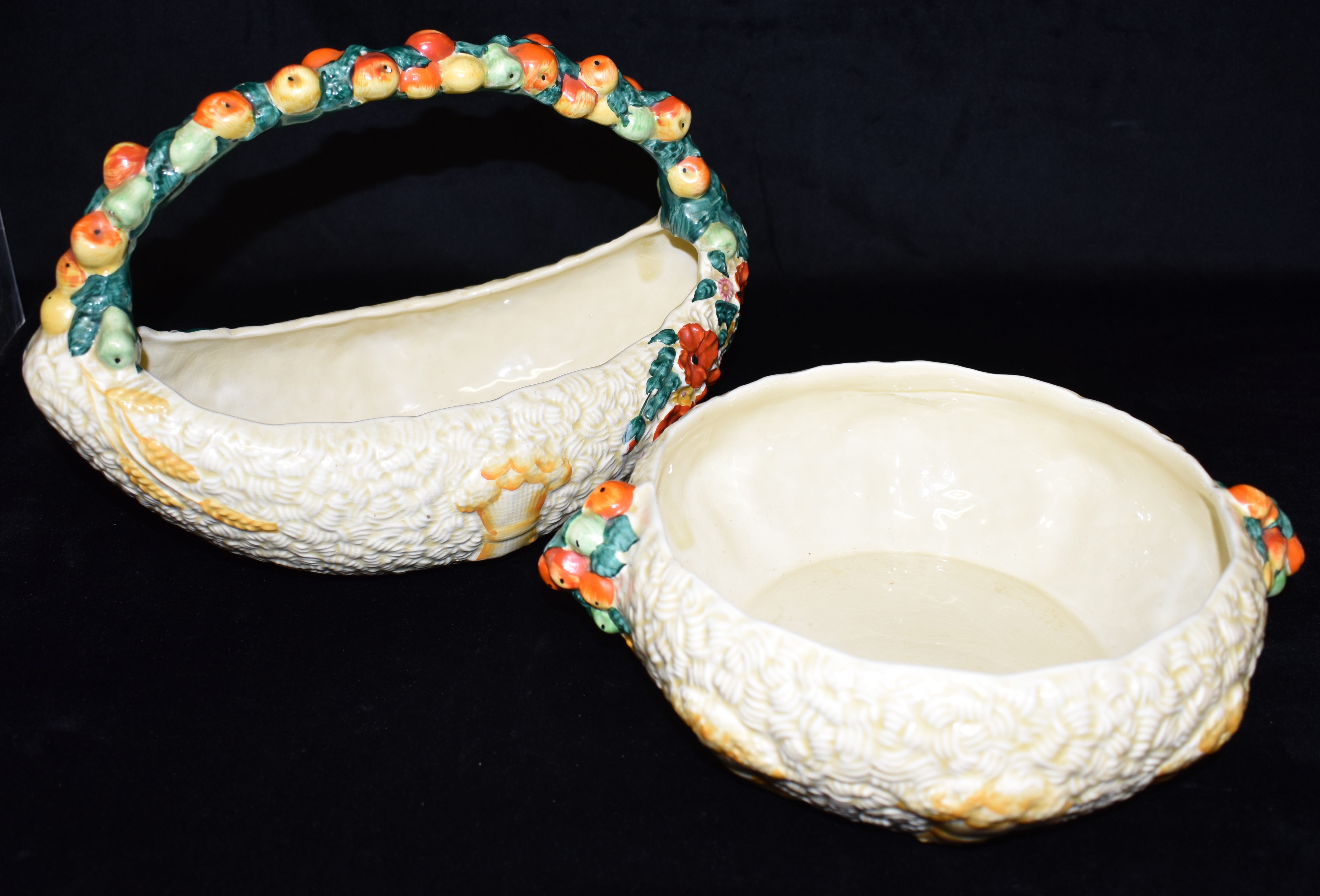 A CLARICE CLIFF NEWPORT POTTERY 'CELTIC HARVEST' BASKET 33cm long, and a matching bowl 24cm