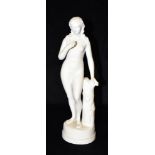 A VICTORIAN PARIAN FIGURE OF EVE modelled standing with an apple in her right hand, 30cm high