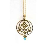 A MARKED 9CT SEED PEARL AND TURQUOISE OPENWORK PENDANT on a marked 9ct fine chain, the circular