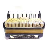 A HOHNER PIANO ACCORDIAN with an applied retailer's plaque for Bell Accordians Ltd, Surbiton,