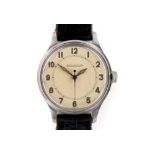 A VINTAGE JAEGER-LeCOULTRE GENTLEMENS WATCH Fitted with a stainless steel back, champagne signed