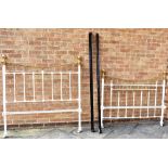 A BRASS AND IRON BEDSTEAD the headboard measuring H 143cm x W 150cm, the bottom H 120cm, the