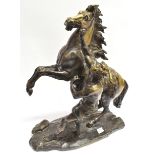 A LARGE PAIR OF PATINATED METAL MARLEY HORSES 60cm high