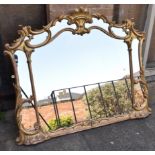 A GILT FRAMED OVERMANTLE MIRROR 133cm wide 106cm high Condition Report : good condition, minor