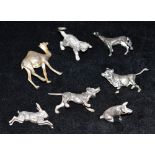 A COLLECTION OF SEVEN SILVER AND METAL MINIATURE ANIMALS Five marked 925. Horse, Bull, Dog, Rabbit
