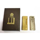A BOXED VINTAGE DUNHILL LIGHTER With original purchase invoice and guarantee dated for 1979,