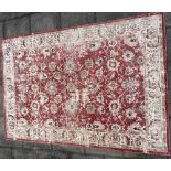 A CONTEMPORARY CREAM/RED GROUND CARPET 198cm x 293cm Condition Report : good condition Condition