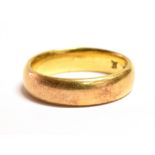 A 22CT GOLD BAND RING ring size N, weight 7.3grams, faded Birmingham markings to the shank