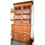 A 19TH CENTURY MAHOGANY BUREAU BOOKCASE with dentil moulded cornice above astragal glazed doors