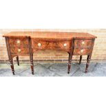 A 19TH CENTURY SHAPED FRONT SIDEBOARD with central drawer flanked by one deep drawer, and drawer and