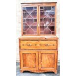 A VICTORIAN SECRETAIRE BOOKCASE the astragal glazed upper section enclosing three adjustable